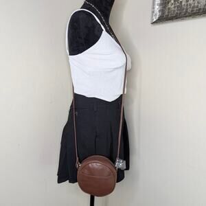 Brown faux leather round